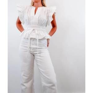 NEW STRUT & BOLT flutter sleeve peplum top in white